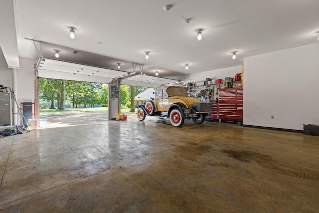 garage featuring baseboards