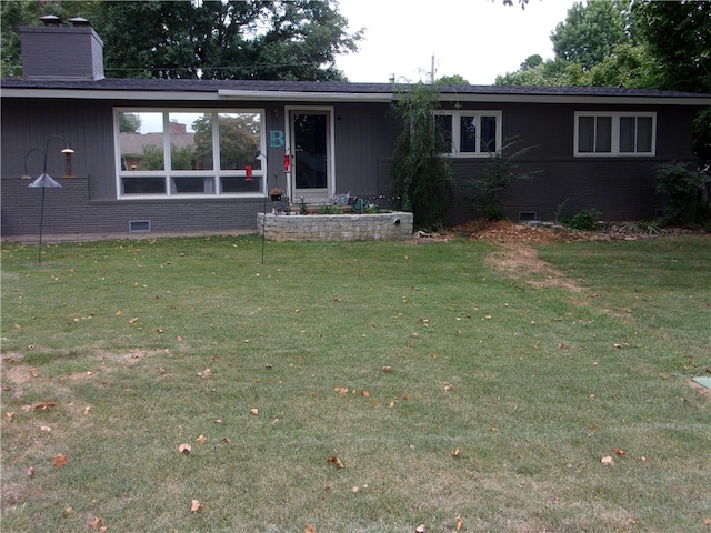 view of front of house with a front yard