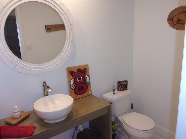 bathroom with sink and toilet