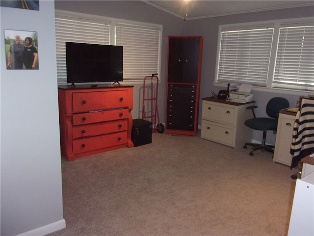 office area featuring light colored carpet, crown molding, and lofted ceiling