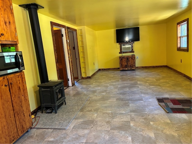 living room featuring a wood stove