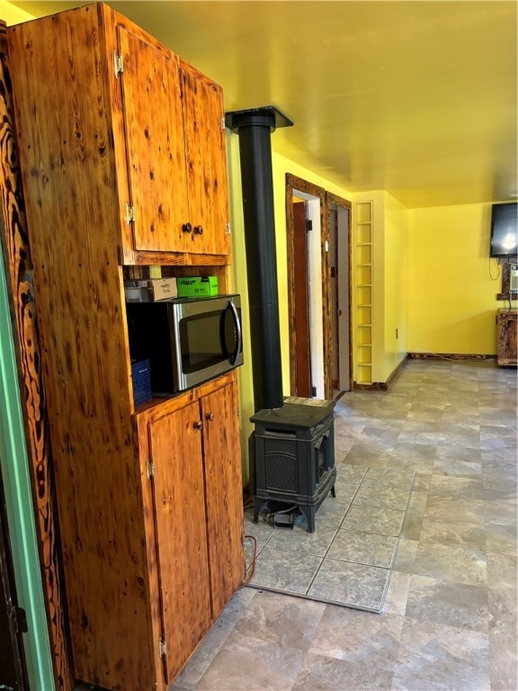 kitchen with a wood stove