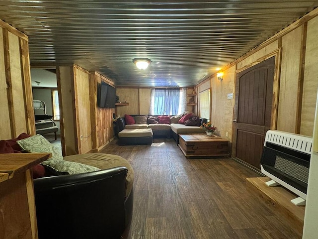 interior space with wood walls and dark hardwood / wood-style flooring