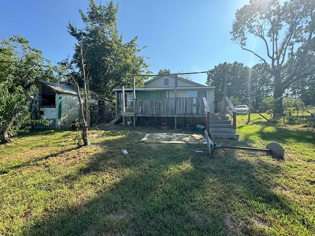 view of yard featuring a deck