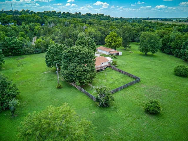 bird's eye view with a rural view and a wooded view