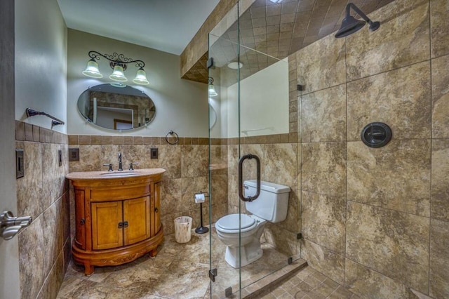 full bath featuring toilet, tile walls, and a tile shower