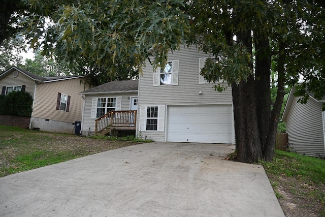 split level home with a garage