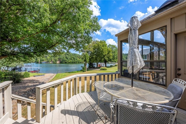 deck featuring a water view