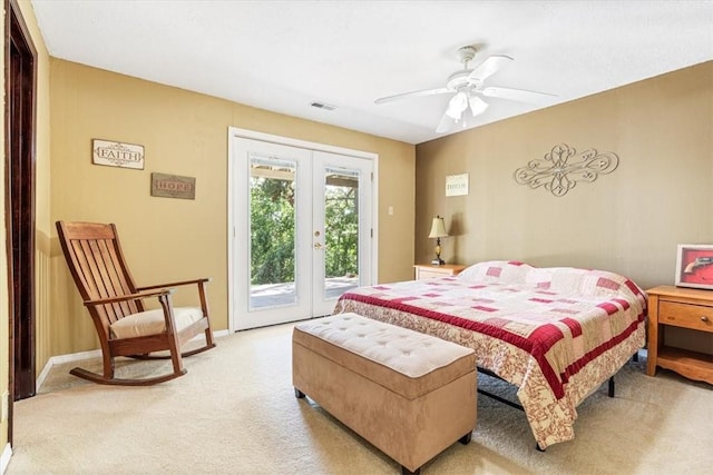 bedroom with baseboards, visible vents, french doors, light carpet, and access to outside