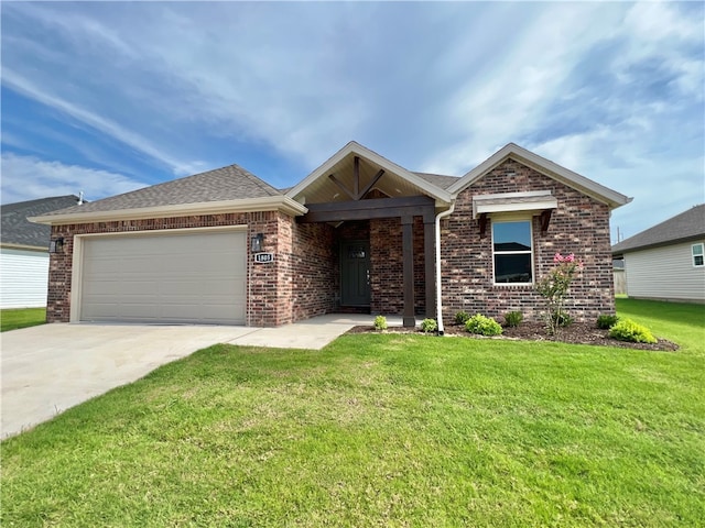 ranch-style house featuring a garage and a front lawn