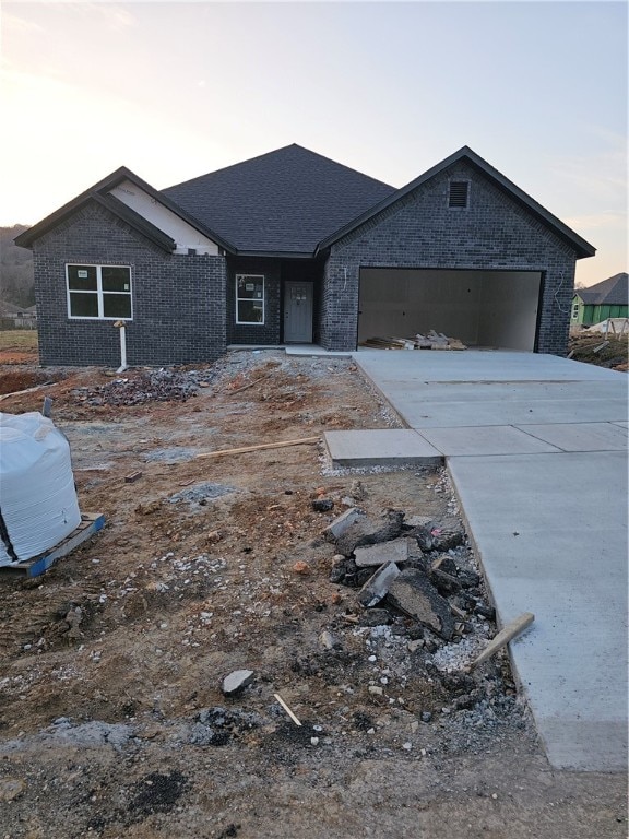 view of front of property featuring a garage