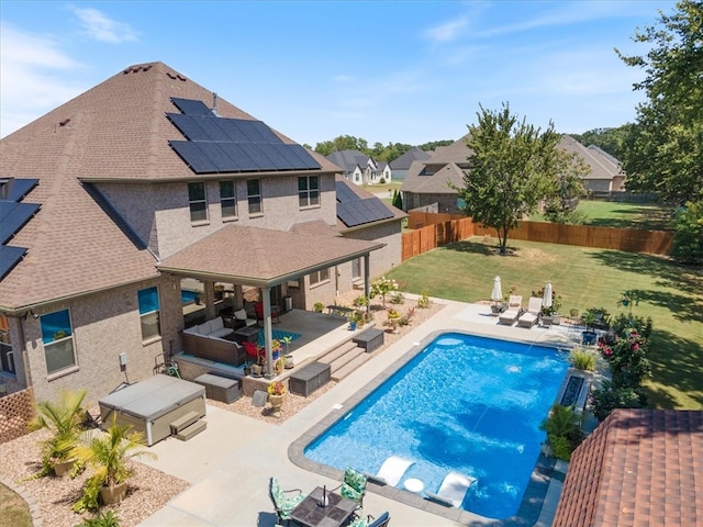 view of pool with a patio, an outdoor hangout area, and a lawn