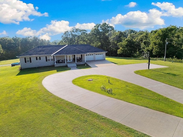 single story home featuring a front yard, a garage, and covered porch