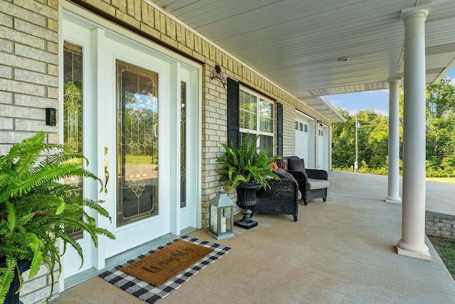 view of patio with a garage