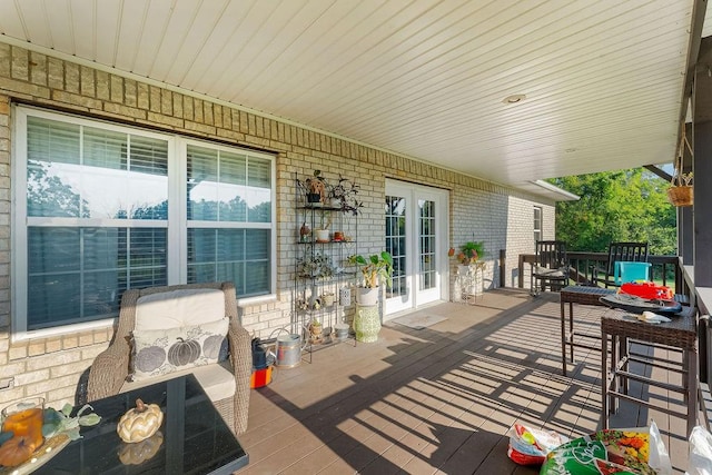 wooden deck with french doors