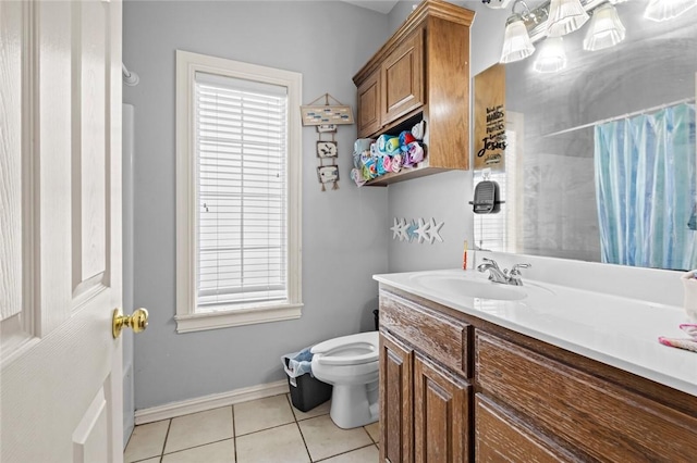 full bathroom with baseboards, toilet, curtained shower, tile patterned flooring, and vanity