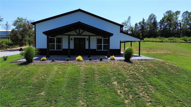 view of front of home with a front lawn and a porch