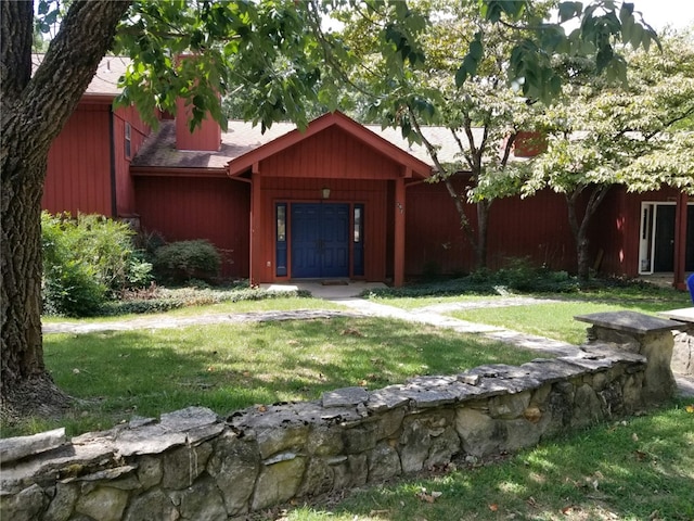 exterior space with a front yard