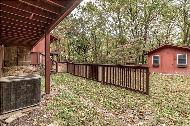 view of yard with stairway and central air condition unit