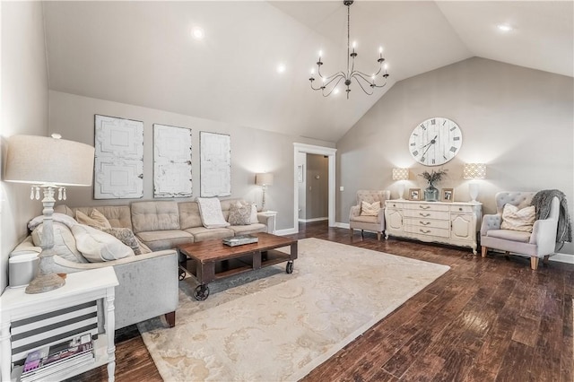 living area featuring an inviting chandelier, wood finished floors, baseboards, and high vaulted ceiling