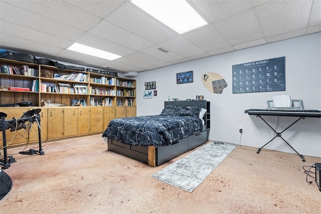 bedroom featuring a paneled ceiling