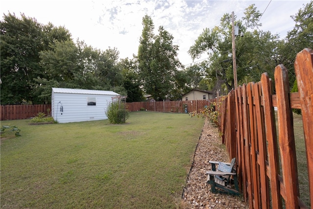 view of yard with a shed