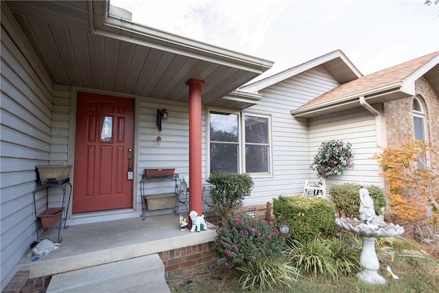 property entrance featuring a porch