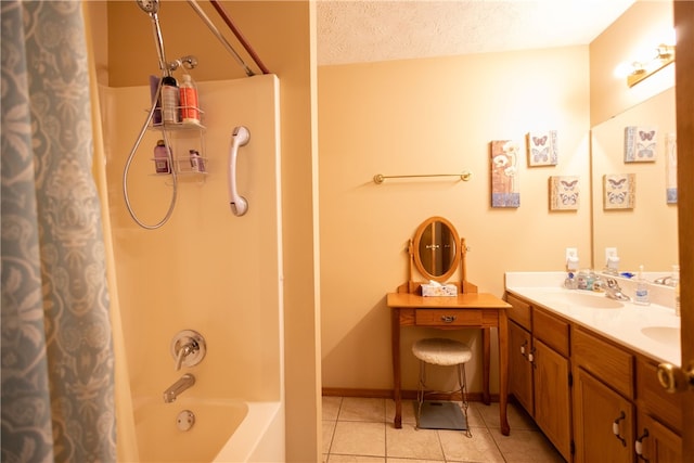 bathroom featuring tile patterned floors, a textured ceiling, shower / bath combination with curtain, and vanity