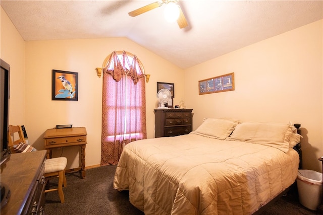 carpeted bedroom with ceiling fan and lofted ceiling