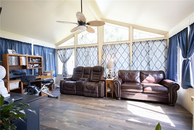 living room with hardwood / wood-style floors, a wealth of natural light, ceiling fan, and lofted ceiling