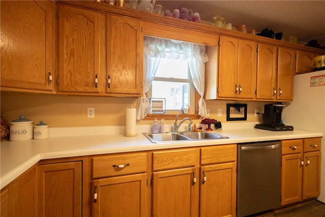 kitchen with sink, refrigerator, and dishwasher