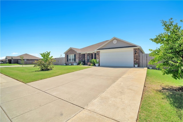 ranch-style home with a garage and a front lawn