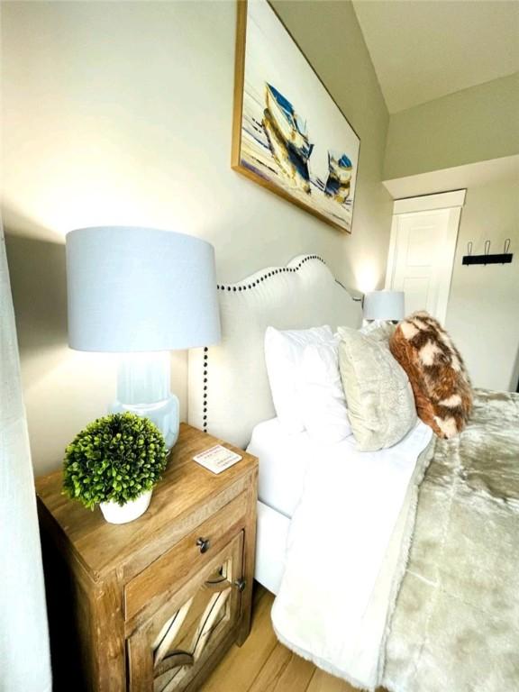 bedroom with light wood-style flooring