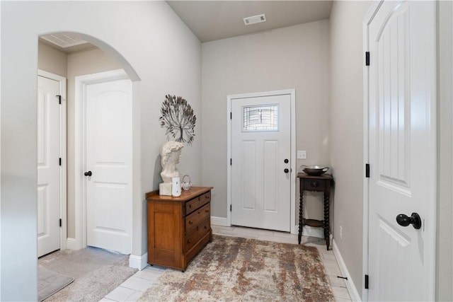 view of tiled foyer entrance