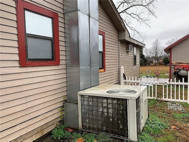 view of home's exterior with central AC