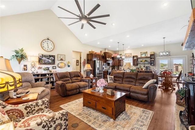 living room featuring ceiling fan, high vaulted ceiling, french doors, and dark hardwood / wood-style floors