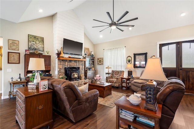 living room featuring a fireplace, high vaulted ceiling, ceiling fan, and dark hardwood / wood-style flooring