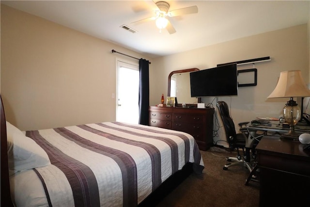 bedroom with a ceiling fan, carpet, and visible vents