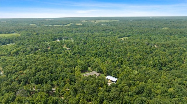 bird's eye view featuring a view of trees