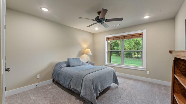 bedroom featuring carpet floors, recessed lighting, and baseboards