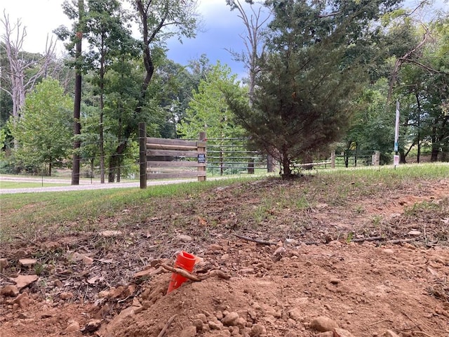 view of property's community featuring fence