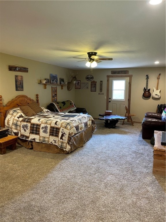 bedroom with ceiling fan and carpet