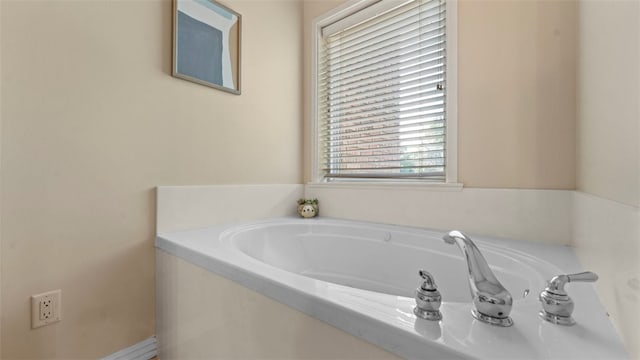 bathroom featuring a tub