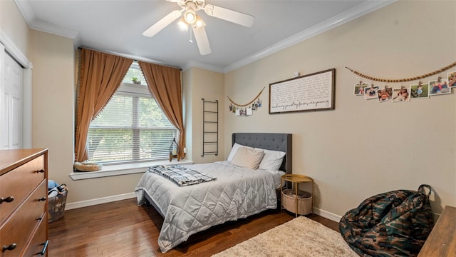 bedroom with ornamental molding, a closet, ceiling fan, and dark hardwood / wood-style floors