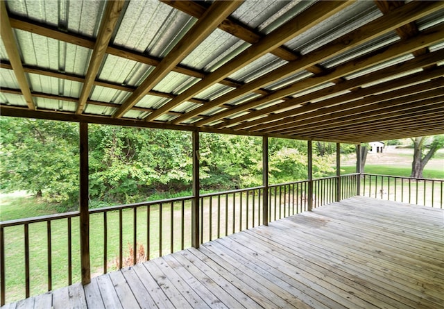 wooden terrace with a yard