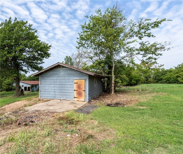 garage with a lawn