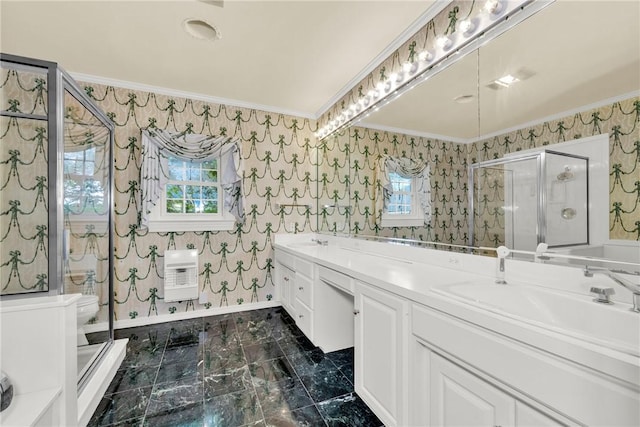 bathroom featuring ornamental molding, heating unit, a shower stall, wallpapered walls, and a healthy amount of sunlight