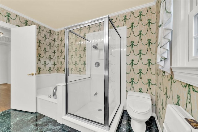 bathroom featuring a garden tub, toilet, ornamental molding, a shower stall, and wallpapered walls