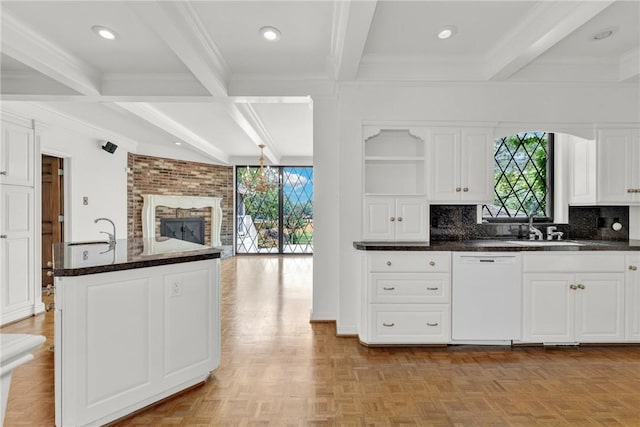 kitchen featuring open shelves, beamed ceiling, white dishwasher, and a sink