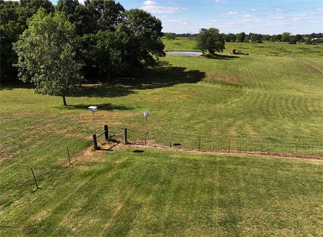 view of yard with a rural view